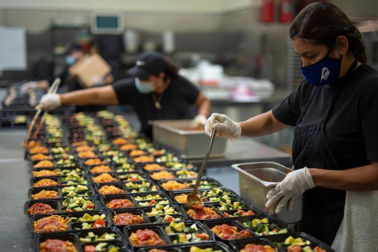 Photo for: LA restaurants owners prepare meals for seniors